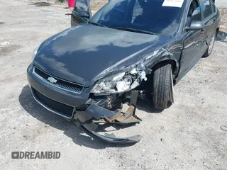 2014 Chevrolet Impala LT with VIN 2G1WB5E31E1146318, listed as a IAAI auction lot 40413281 with 422,345 mi miles and . Bid and sale history available at DreamBid. Image 6.