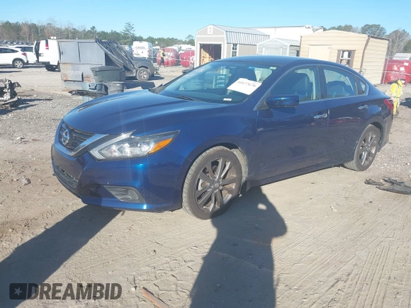 2018 Nissan Altima 2.5 SR with VIN 1N4AL3AP7JC291210, listed as a IAAI auction lot 41677670 with 142,994 mi miles. Bid and sale history available at carsss.com. Image 18.
