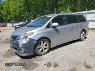 2012 Toyota Sienna SE with VIN 5TDXK3DC7CS239254, listed as a Copart auction lot 53244725 with 134,669 mi miles and Clean Title. Bid and sale history available at carsss.com. Image 1.