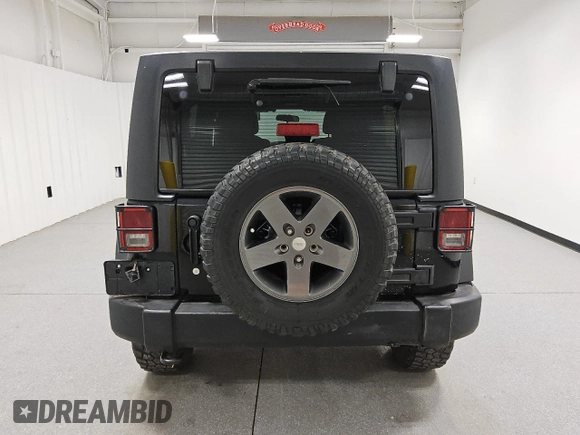 2011 Jeep Wrangler Unlimited Rubicon with VIN 1J4HA6H16BL551870, listed as a Copart auction lot 56754715 with 154,890 mi miles and Clean title. Bid and sale history available at DreamBid. Image 6.
