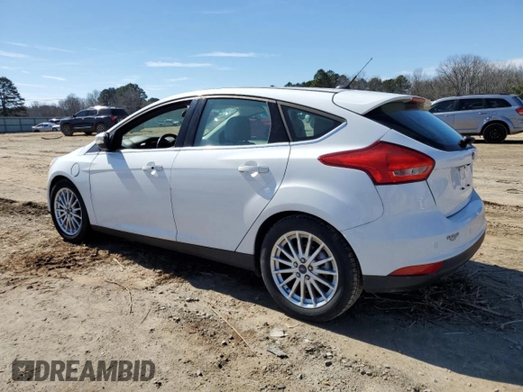 2016 Ford Focus Electric z VIN 1FADP3R42GL277445, wystawiony jako Copart lot #46379555 z przebiegiem 7007 mil mil oraz Tytuł czysty. Historia ofert i sprzedaży dostępna na DreamBid. Obrazek 2.