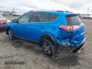 2018 Toyota RAV4 XLE with VIN 2T3RFREV0JW722354, listed as a IAAI auction lot 41974466 with 65,013 mi miles. Bid and sale history available at carsss.com. Image 3.