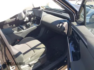 2023 Subaru Solterra Limited with VIN JTMABABA4PA022761, listed as a IAAI auction lot 41824628 with 11,601 mi miles and . Bid and sale history available at DreamBid. Image 5.
