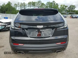 2021 Cadillac XT4 FWD Sport with VIN 1GYFZER42MF024204, listed as a Copart auction lot 63955904 with 31,262 mi miles and Salvage Title. Bid and sale history available at DreamBid. Image 6.