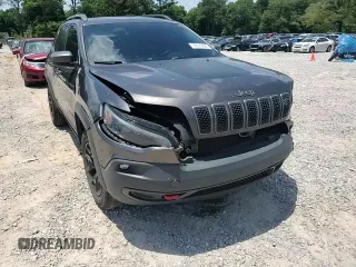 2019 Jeep Cherokee Trailhawk с VIN 1C4PJMBX5KD278692, выставлен на аукционе Copart как лот 56912285 с пробегом 110 964 миль миль и Списание • Salvage title. История ставок и продаж доступна на DreamBid. Изображение 14.