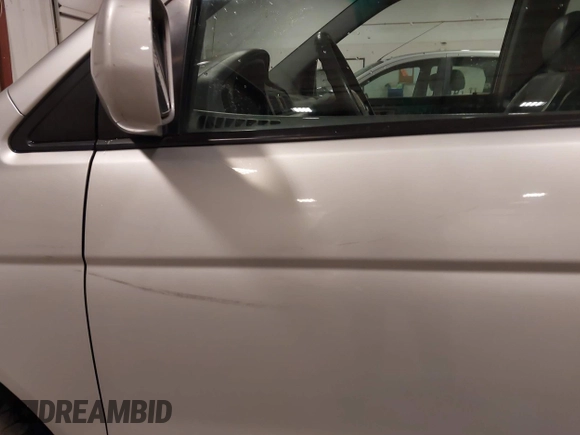 2004 Honda Odyssey EX-L with VIN 5FNRL18974B127696, listed as a IAAI auction lot 41643243 with 200,286 mi miles and . Bid and sale history available at DreamBid. Image 19.