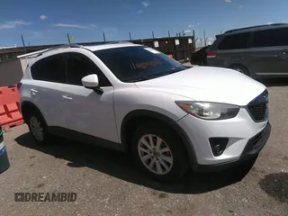 2014 Mazda CX-5 Touring with VIN JM3KE2CY7E0364311, listed as a IAAI auction lot 42108176 with 90,506 mi miles and . Bid and sale history available at DreamBid. Image 13.