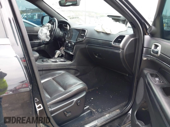 2021 Jeep Grand Cherokee 80th Anniversary with VIN 1C4RJFBG8MC645520, listed as a IAAI auction lot 41920038 with 84,479 mi miles and . Bid and sale history available at DreamBid. Image 5.