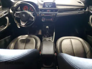 2017 BMW X1 xDrive28i with VIN WBXHT3Z39H4A51967, listed as a Copart auction lot 58843125 with 108,415 mi miles and Clean title. Bid and sale history available at DreamBid. Image 8.