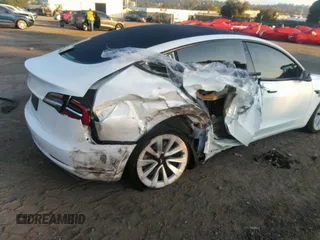 2023 Tesla Model 3 z VIN 5YJ3E1EA3PF449187, wystawiony jako IAAI lot #40320939 z przebiegiem Nie podano mil oraz . Historia ofert i sprzedaży dostępna na DreamBid. Obrazek 5.