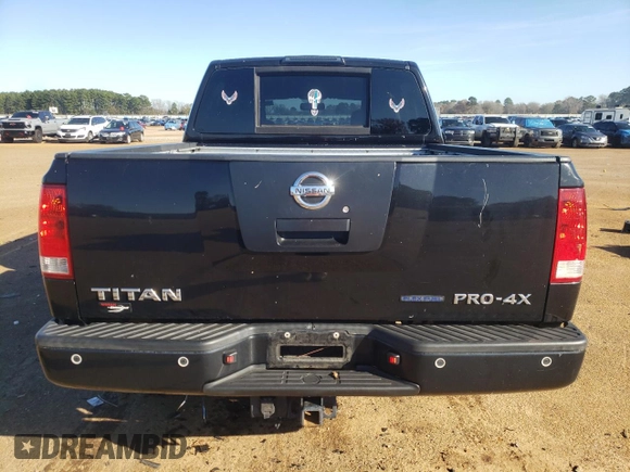 2011 Nissan Titan Pro-4X с VIN 1N6BA0ECXBN300561, выставлен на аукционе Copart как лот 85480484 с пробегом 158 547 миль миль и Списание • Salvage title. История ставок и продаж доступна на DreamBid. Изображение 6.