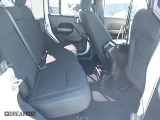 2018 Jeep Wrangler Unlimited Sport S with VIN 1C4HJXDG0JW140869, listed as a IAAI auction lot 41623256 with 112,197 mi miles. Bid and sale history available at carsss.com. Image 8.