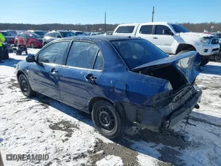 2003 Mitsubishi Lancer ES with VIN JA3AJ26E13U0A3996, listed as a IAAI auction lot 41251250 with 223,311 mi miles. Bid and sale history available at carsss.com. Image 3.