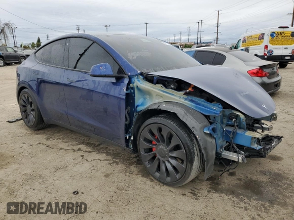 2022 Tesla Model Y Performance with VIN 7SAYGDEFXNF438281, listed as a Copart auction lot 53706435 with Not provided miles and Salvage title. Bid and sale history available at DreamBid. Image 4.