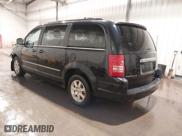 2010 Chrysler Town & Country Touring z VIN 2A4RR5D1XAR148753, wystawiony jako IAAI lot #41830153 z przebiegiem 158 867 mil mil oraz . Historia ofert i sprzedaży dostępna na DreamBid. Obrazek 3.