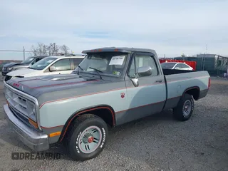 1988 Dodge D/W 100 with VIN 1B7FD04X9JS676023, listed as a IAAI auction lot 40746708 with 98,215 mi miles. Bid and sale history available at carsss.com. Image 2.