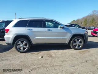 2013 Jeep Grand Cherokee Limited with VIN 1C4RJFBG5DC634023, listed as a IAAI auction lot 41828704 with 132,286 mi miles. Bid and sale history available at carsss.com. Image 13.