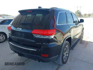 2014 Jeep Grand Cherokee Limited with VIN 1C4RJFBG8EC517456, listed as a IAAI auction lot 41893883 with 141,906 mi miles. Bid and sale history available at carsss.com. Image 4.