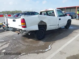 2000 GMC New Sierra 1500 SL with VIN 1GTEC14VXYE124476, listed as a IAAI auction lot 41918838 with 184,796 mi miles. Bid and sale history available at carsss.com. Image 4.