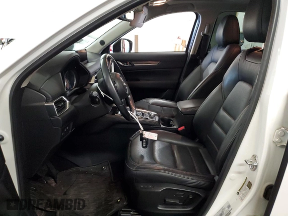 2018 Mazda CX-5 Grand Touring with VIN JM3KFBDM6J0455993, listed as a Copart auction lot 61414275 with 77,570 mi miles and Salvage title. Bid and sale history available at DreamBid. Image 7.