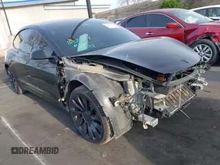 2023 Tesla Model 3 Performance z VIN 5YJ3E1EC3PF716085, wystawiony jako IAAI lot #41911684 z przebiegiem 45 184 mil mil oraz . Historia ofert i sprzedaży dostępna na DreamBid. Obrazek 1.