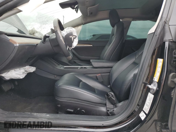 2022 Tesla Model 3 with VIN 5YJ3E1EA3NF190102, listed as a Copart auction lot 50657535 with 73,015 mi miles and Salvage Title. Bid and sale history available at DreamBid. Image 7.