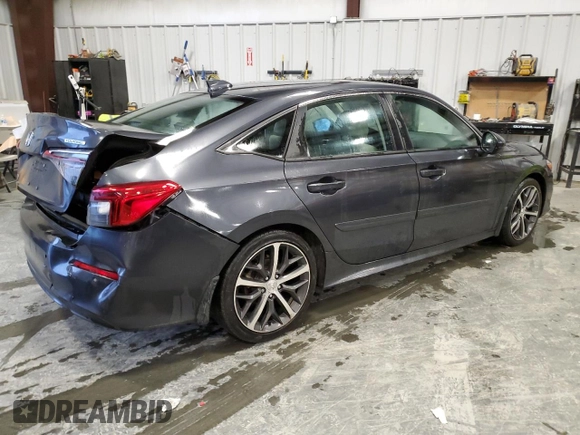 2022 Honda Civic Touring z VIN 2HGFE1F92NH315300, wystawiony jako Copart lot #44444605 z przebiegiem 52 469 mil mil oraz Szkoda całkowita • Salvage title. Historia ofert i sprzedaży dostępna na DreamBid. Obrazek 3.