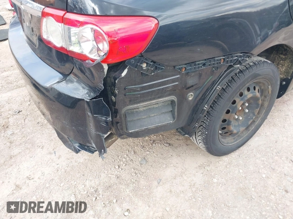 2012 Toyota Corolla L with VIN JTDBU4EE8C9180465, listed as a IAAI auction lot 41861829 with 163,631 mi miles. Bid and sale history available at carsss.com. Image 6.