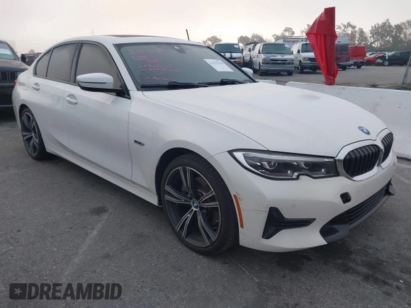 2022 BMW 3 Series 330e with VIN 3MW5P7J04N8C40865, listed as a IAAI auction lot 41635704 with 44,929 mi miles. Bid and sale history available at carsss.com. Image 1.