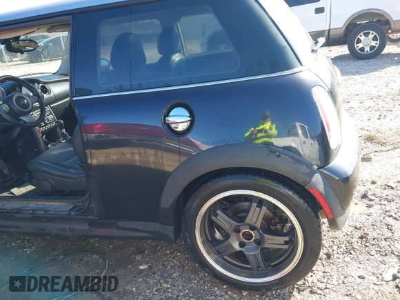 2006 MINI Hardtop S with VIN WMWRE33546TJ34712, listed as a IAAI auction lot 41144701 with 230,006 mi miles and . Bid and sale history available at DreamBid. Image 6.