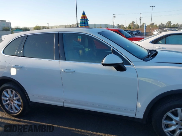 2014 Porsche Cayenne with VIN WP1AA2A28ELA96123, listed as a IAAI auction lot 42010456 with 154,312 mi miles and . Bid and sale history available at DreamBid. Image 14.