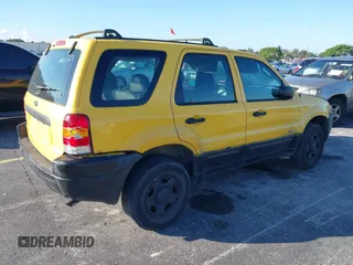 2002 Ford Escape XLS Choice with VIN 1FMYU01132KD56671, listed as a IAAI auction lot 41552541 with 245,923 mi miles and . Bid and sale history available at DreamBid. Image 4.