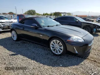 2010 Jaguar XK with VIN SAJWA4GB5ALB36022, listed as a Copart auction lot 56038565 with 101,988 mi miles and Clean Title. Bid and sale history available at DreamBid. Image 4.