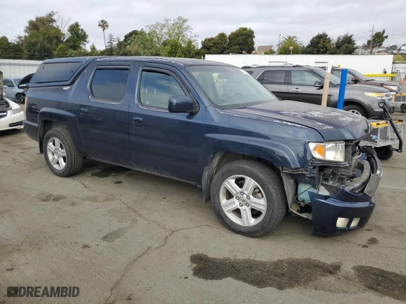 2010 Honda Ridgeline RTL with VIN 5FPYK1F50AB005120, listed as a Copart auction lot 53569115 with 173,878 mi miles and Salvage Title. Bid and sale history available at carsss.com. Image 4.
