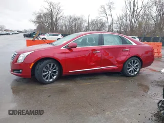 2013 Cadillac XTS z VIN 2G61N5S36D9129188, wystawiony jako IAAI lot #41824147 z przebiegiem 80 985 mil mil oraz . Historia ofert i sprzedaży dostępna na DreamBid. Obrazek 14.