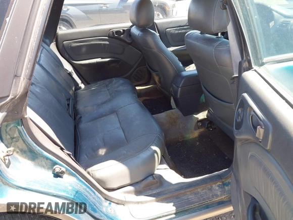 1996 Subaru Legacy Outback z VIN 4S3BG6854T7980058, wystawiony jako IAAI lot #42641853 z przebiegiem 291 685 mil mil oraz . Historia ofert i sprzedaży dostępna na DreamBid. Obrazek 8.