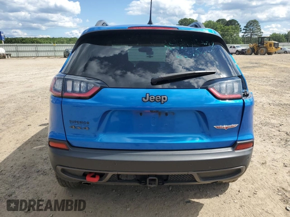 2019 Jeep Cherokee Trailhawk with VIN 1C4PJMBX0KD311114, listed as a Copart auction lot 58799765 with 60,833 mi miles and Salvage title. Bid and sale history available at DreamBid. Image 6.