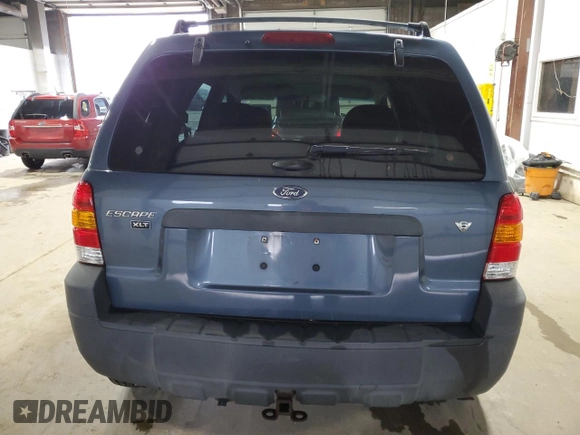 2005 Ford Escape XLT z VIN 1FMYU93145KB29172, wystawiony jako Copart lot #57724475 z przebiegiem 146 236 mil mil oraz Szkoda całkowita • Salvage title. Historia ofert i sprzedaży dostępna na DreamBid. Obrazek 6.