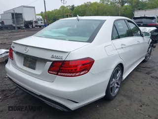 2014 Mercedes-Benz E 350 Luxury with VIN WDDHF8JB8EA980004, listed as a IAAI auction lot 42160745 with 58,418 mi miles and . Bid and sale history available at DreamBid. Image 4.