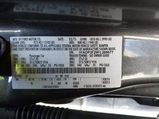 2015 Ford Focus SE with VIN 1FADP3F29FL268677, listed as a IAAI auction lot 42037244 with 118,018 mi miles. Bid and sale history available at carsss.com. Image 9.