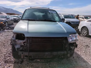 2006 Ford Escape XLT with VIN 1FMYU93166KC50125, listed as a Copart auction lot 53050325 with 136,456 mi miles and Salvage Title. Bid and sale history available at carsss.com. Image 5.