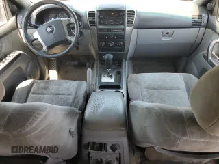 2006 Kia Sorento LX with VIN KNDJD733X65578898, listed as a Copart auction lot 60261065 with 144,087 mi miles and Salvage title. Bid and sale history available at DreamBid. Image 8.