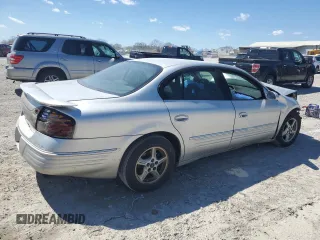 2001 Pontiac Bonneville SE z VIN 1G2HX54K714188652, wystawiony jako Copart lot #49488005 z przebiegiem 157 968 mil mil oraz Tytuł czysty. Historia ofert i sprzedaży dostępna na DreamBid. Obrazek 3.