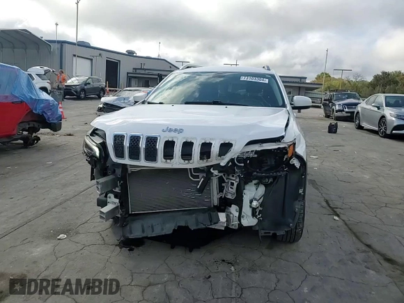 2019 Jeep Cherokee Latitude Plus with VIN 1C4PJMLX7KD251993, listed as a Copart auction lot 73103304 with 71,523 mi miles and Salvage Title. Bid and sale history available at carsss.com. Image 12.
