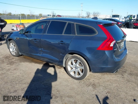 2015 Volvo V60 T5 Drive-E with VIN YV140MEJ8F1261268, listed as a IAAI auction lot 41517740 with 112,991 mi miles. Bid and sale history available at carsss.com. Image 3.