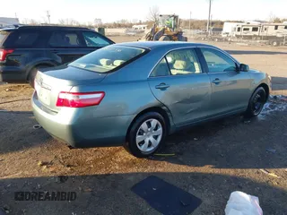 2007 Toyota Camry CE with VIN 4T1BE46K27U719789, listed as a IAAI auction lot 41761056 with 135,818 mi miles and . Bid and sale history available at DreamBid. Image 4.