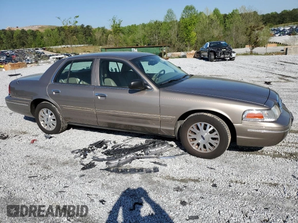2005 Ford Crown Victoria LX z VIN 2FAFP74WX5X166506, wystawiony jako Copart lot #52141265 z przebiegiem 117 686 mil mil oraz Szkoda całkowita • Salvage title. Historia ofert i sprzedaży dostępna na DreamBid. Obrazek 4.