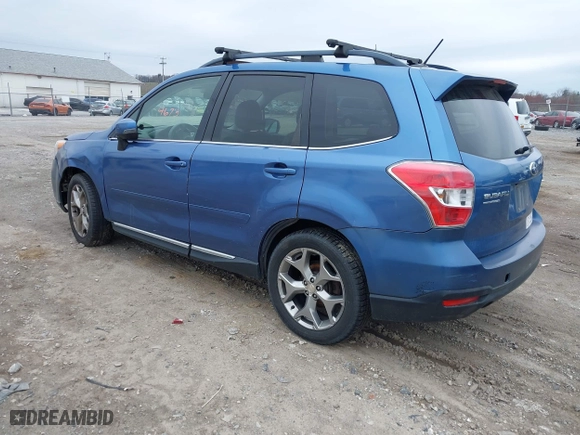 2015 Subaru Forester 2.5i Touring with VIN JF2SJAWC9FH415634, listed as a IAAI auction lot 41954673 with 140,507 mi miles. Bid and sale history available at carsss.com. Image 3.