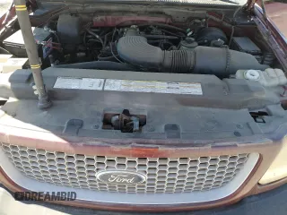 1999 Ford F-150 XL with VIN 1FTRX17L2XKB78998, listed as a Copart auction lot 65004535 with 155,271 mi miles and Salvage title. Bid and sale history available at DreamBid. Image 11.