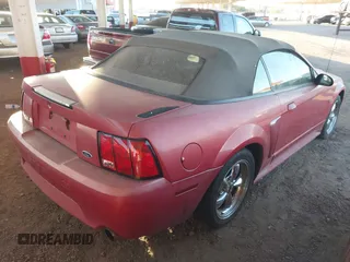 2000 Ford Mustang GT z VIN 1FAFP45X2YF186187, wystawiony jako IAAI lot #41467944 z przebiegiem 163 463 mil mil oraz . Historia ofert i sprzedaży dostępna na DreamBid. Obrazek 4.